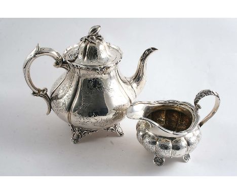 A VICTORIAN ENGRAVED COFFEE POT of baluster form with a domed cover, scroll handle and fruit finial, by Robert Harper, London