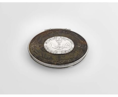 A GEORGE I SILVER MOUNTED TORTOISESHELL SNUFF BOX navette-shaped with reeded borders and a "stand-away" hinge, the cover with
