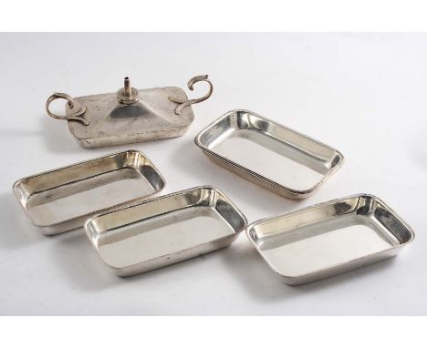 AN EARLY 20TH CENTURY NEST OF SIX ASH TRAYS &amp; A SPIRIT LIGHTER of rectangular form with rounded corners and two scroll ha