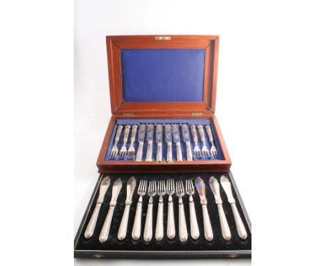 A VICTORIAN CASED SET OF SIX PAIRS OF FISH KNIVES & FORKS with loaded handles, decorated with beading and engine-turning by R