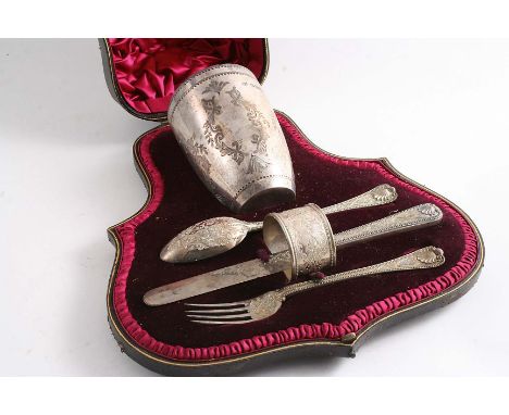 A VICTORIAN ENGRAVED CHRISTENING SET in a lined & fitted case including a beaker by J.N. Mappin and a napkin ring, knife, for