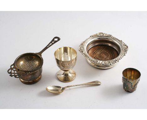 MISCELLANEOUS SMALL SILVER:- A child's egg cup engraved with chickens & a duck, with spoon, a tea strainer & drip bowl, an Ed