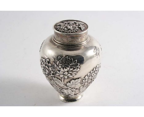 A LATE 19TH / EARLY 20TH CENTURY INDIAN TEA CADDY in the style of a Chinese example of vase form with embossed Chrysanthemum 