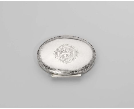 A QUEEN ANNE SILVER OVAL SNUFF BOX with a "stand-away" hinge, the cover engraved with a coat of arms within a scrolled circul