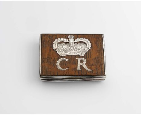 A GEORGE II SILVER-MOUNTED OAK SNUFF BOX rectangular with reeded borders and moulded sides, the cover inlaid with the cut-out