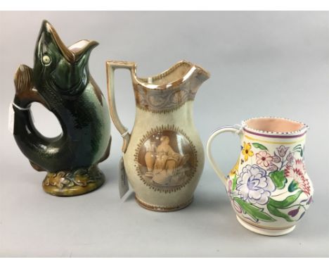 LOT OF POOLE POTTERY, including a vase, tea pot, cream jug and water jug; along with a glug jug and three other jugs