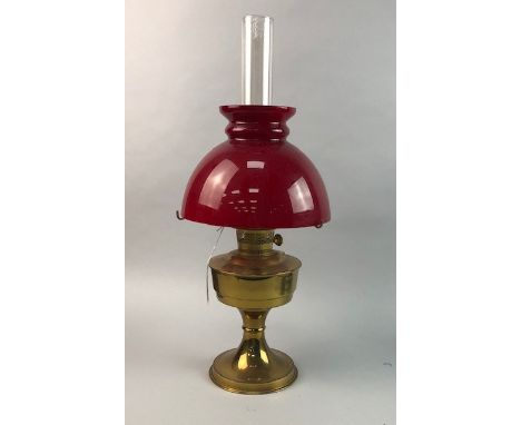 BRASS OIL LAMP, with red glass shade
