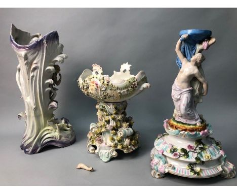 TWO CONTINENTAL CERAMIC CENTREPIECES, along with a Continental ceramic candlestick (3) (damages)