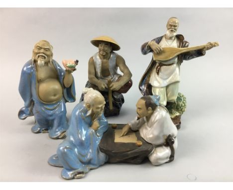 LOT OF SEVEN CHINESE GLAZED CERAMIC FIGURES, modelled in various activities such as playing instruments and games, reading, e