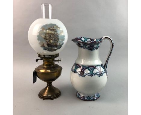 BRASS PARAFFIN LAMP, the shade decorated with a ship; along with a Victorian jug