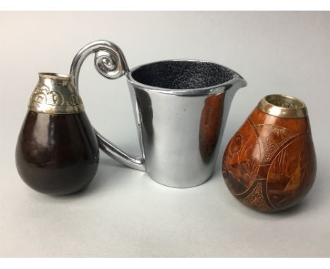 CONTINENTAL SILVER COLLARED NUT FLASK, with engraved decoration; along with a white metal collared nut flask and a Carrol Boy