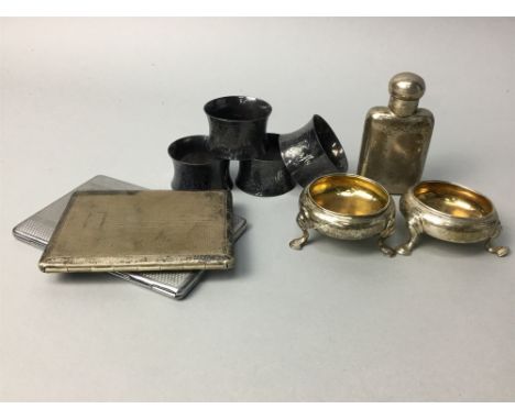 SMALL SILVER HIP FLASK, with Birmingham marks; along with two silver dishes, two cigarette cases and four napkin rings