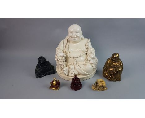 LARGE WHITE CERAMIC BUDDHA, along with five other buddha figures including a brass example (6)