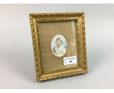 JAMES BAYNE (20TH CENTURY IRISH ARTIST), PORTRAIT OF A YOUNG BOY, watercolour and body colour, approximately 6cm x 4cm, frame