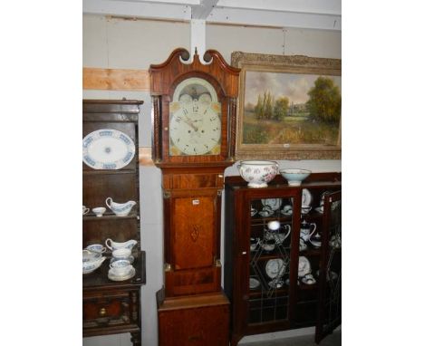 A good oak inlaid eight day Grandfather clock in working order, COLLECT ONLY.Door lock is an older replacement.Finial on hood