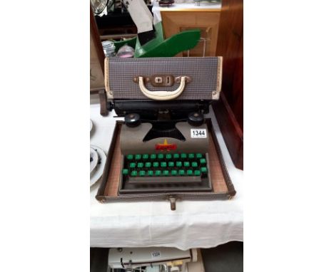 A vintage Lilliput typewriter, COLLECT ONLY