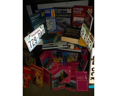 A quantity of car manuals, Ordnance Survey maps etc.,