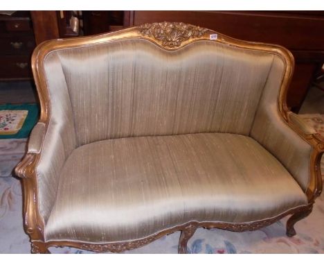 A gilt framed two seater sofa. COLLECT ONLY.