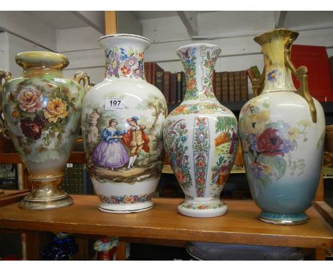 Four tall ceramic vases. COLLECT ONLY.