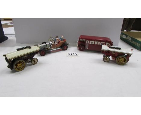 A Corgi Chitty Chitty Bang Bang car (complete) a Hornby Thomas bus and two Lesney traction engines.