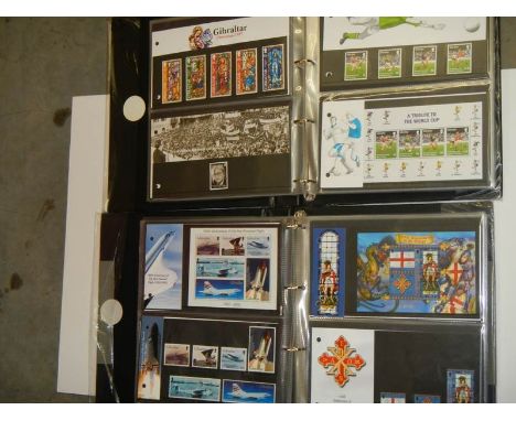 Two albums of first day covers.