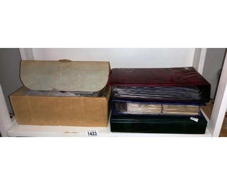 A large quantity of first day covers, stamps, postcards etc