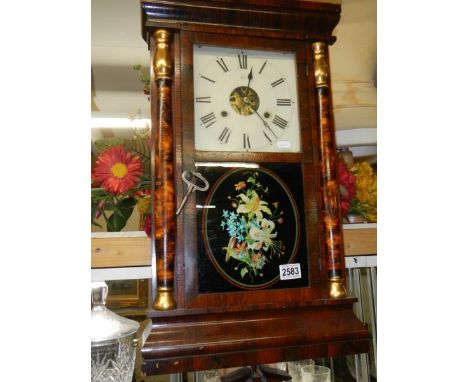 A Victorian American wall clock, in working order. COLLECT ONLY.