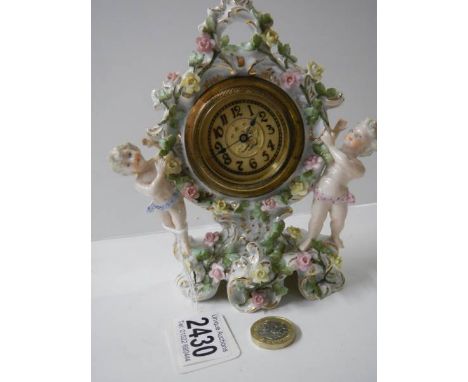A porcelain boudoir clock.