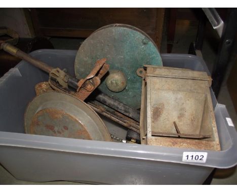 A box of metalware including cast iron, shoe lasts, brass bilge pump, dunlop junior foot pump, galvanised chicken feeder COLL