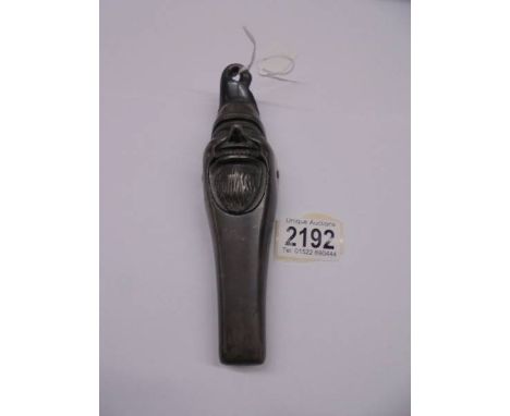 An old clown nut cracker.
