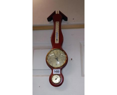 A modern aneroid barometer, 43cm high