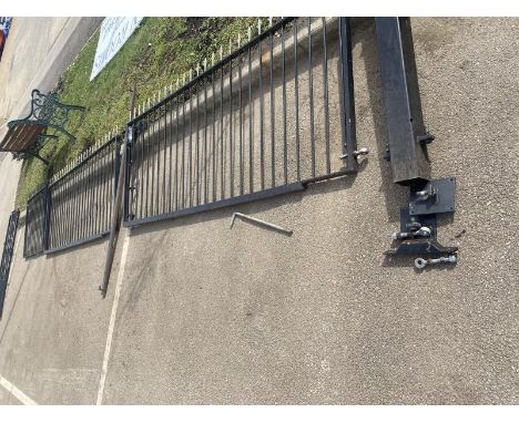 An excellent metal gate set with gates, post and door