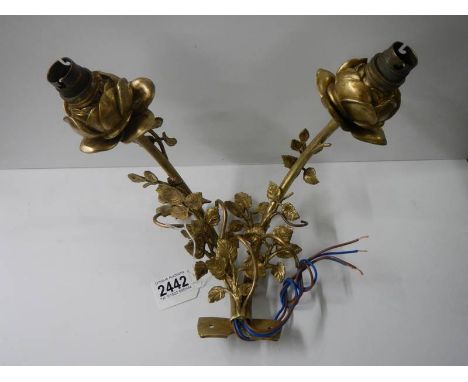 A gilded two lamp wall light.