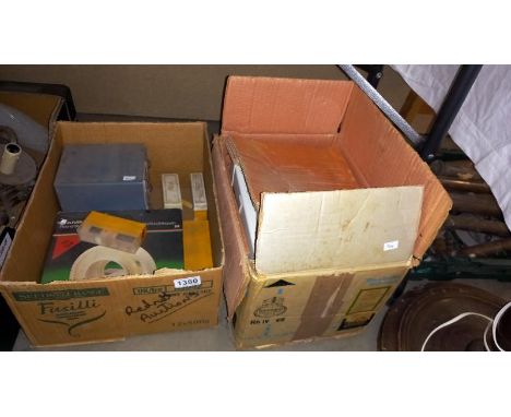 A boxed Paximat Triumph slide projector and various slides