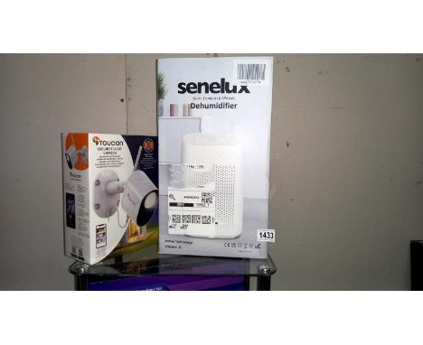 A 'new' boxed security light camera and a 'new' Senelux de-humidifier COLLECT ONLY