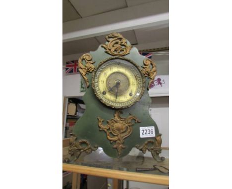 An old heavy metal mantle clock in working order, COLLECT ONLY.