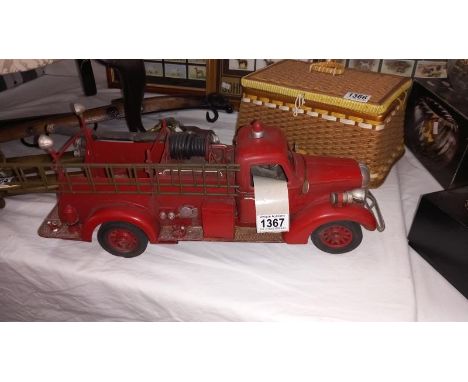 A large scale pressed steel fibre glass model of an American fire truck length 49cm