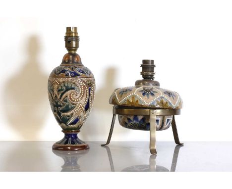 A Doulton Lambeth stoneware oil lamp, converted, with a buff glaze and flower head details, on a brass stand,6cm diameter, an