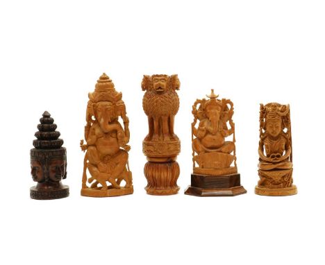 A group of five Indian carved figures,to include the Ashoka Pillar, and Ganesha,the largest 24cm high (5)Condition ReportAll 