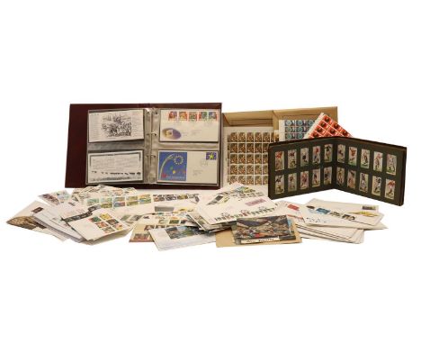 A box album of GB first day covers and black box of stamps with cigarette cards