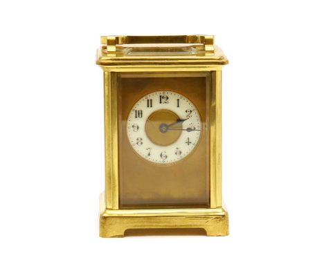 A brass carriage clock,20th century, with an enamel dial, in a leather travelling case,15.5cm highCondition ReportMost recent