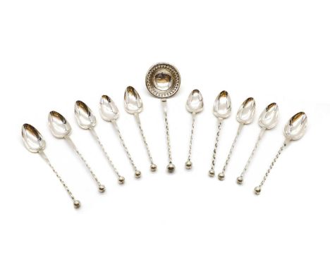 A group of Norwegian silver spiral twist spoons,13 1/2 mark, 19th century, comprising a set of ten teaspoons, and a ladle,3.3