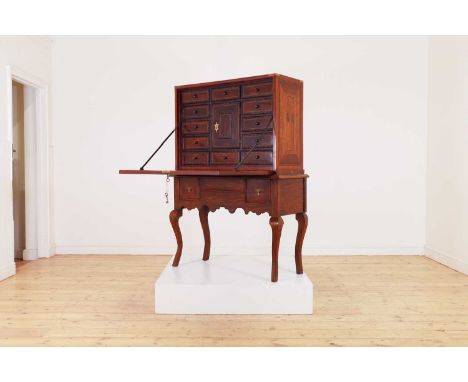 A rosewood, fruitwood and marquetry cabinet,late 17th/early 18th century and later, Continental, with a fall front enclosing 
