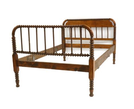 A single bobbin turned bed,135cm wide209cm deep108cm high