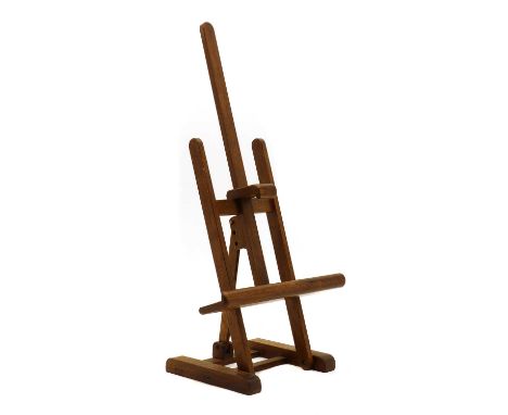 A oak artist's easel,of diminutive proportions,21cm wide15cm deep42cm highCondition ReportNo major flaws.Some play in frame b
