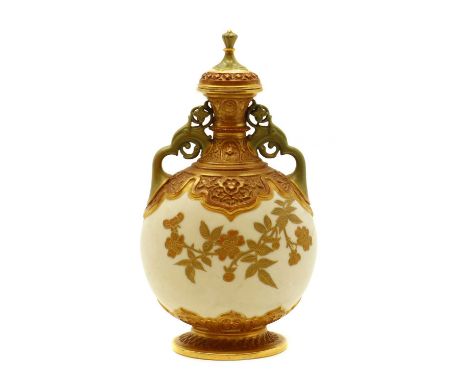 A Royal Worcester porcelain vase and cover,Aesthetic Movement, in the Persian style, the twin handles leading to a bulbous bo