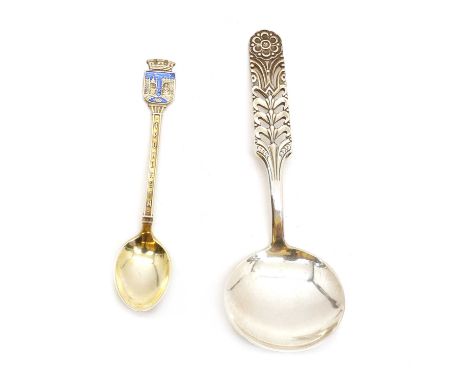 A David Andersen silver spoon,marked 925, Floriform pattern,13cm longtogether with a David Andersen silver gilt souvenir spoo