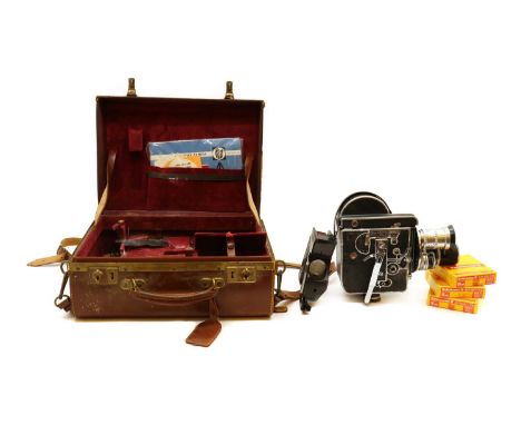 A cased Paillard Bolex H-16 Reflex film camera,1960s, with a 16mm lens, and an instruction leaflet,and three boxed Kodachrome