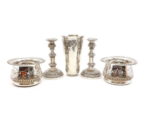 A pair of silver plated candlesticks,heavily embossed with floral decoration, to knop stems,21cm higha silver-plated vase, po