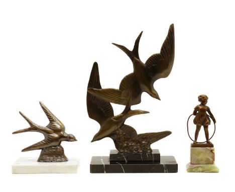 A group of Art Deco style spelter figures,the first depicting two swallows, signed 'M. Font', 32.5cm high, a similar example 